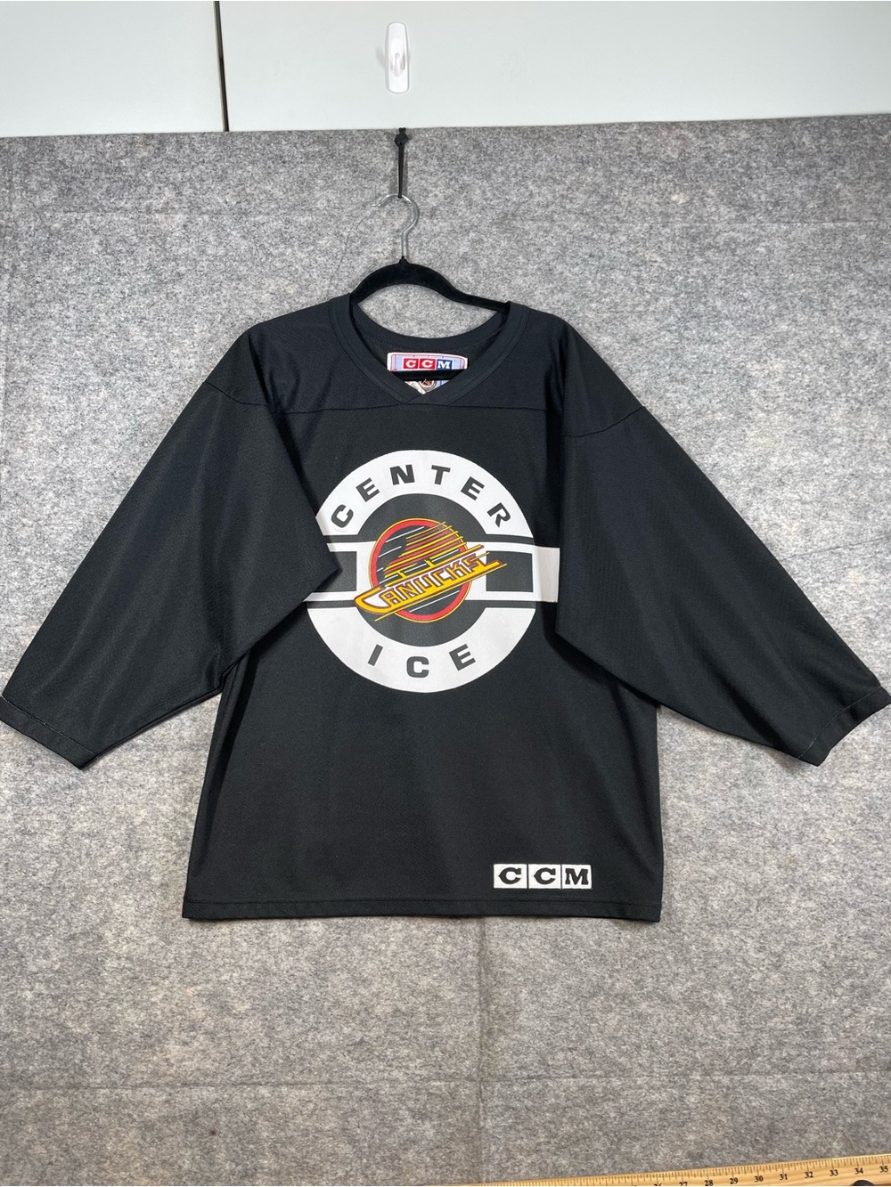 Vintage 90s CCM Men's Black CANUCKS Center Ice Hockey Jersey Size Small